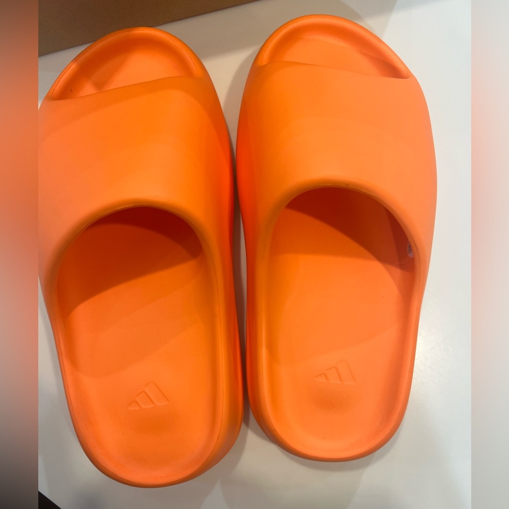 Yeezy by adidas slides.